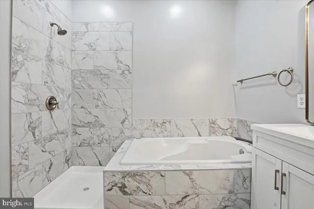 a bathroom with a sink and a bathtub