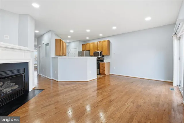 a view of kitchen with furniture and fireplace