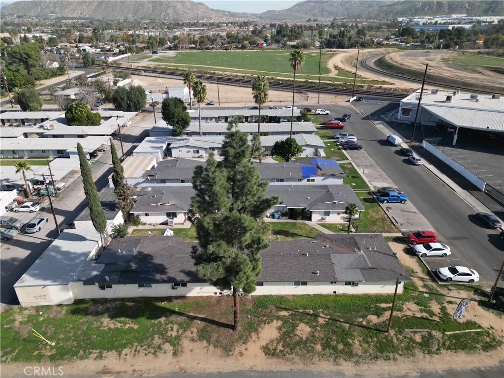 1195 Spring Street Riverside, CA 92507 - Photo 5 of 5 an aerial view of a house with a lake view