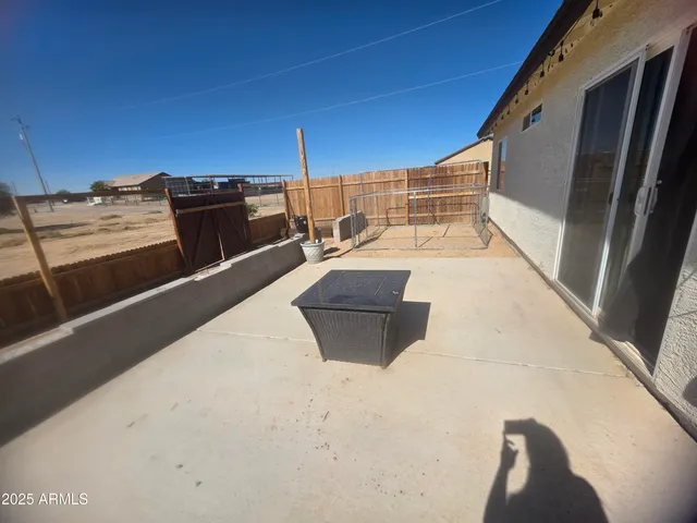 a view of roof deck with seating space