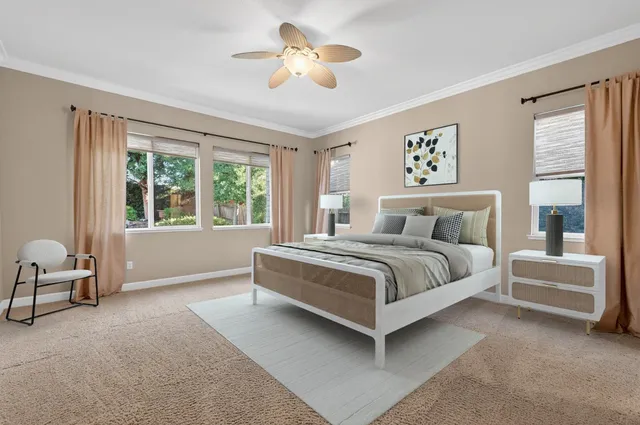 a front view of a house with a garden