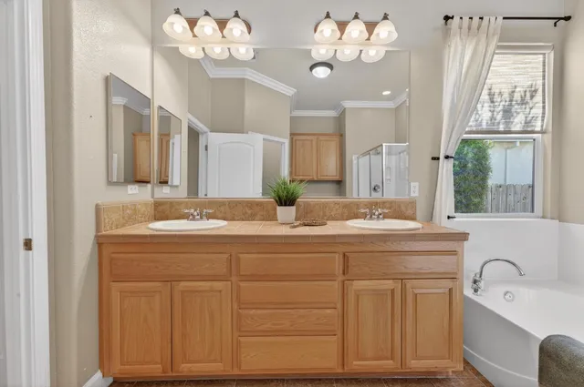 an aerial view of a city with mountains