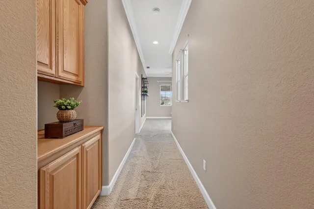 an aerial view of houses with outdoor space