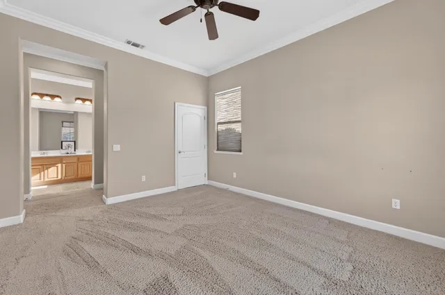 an aerial view of residential houses with yard