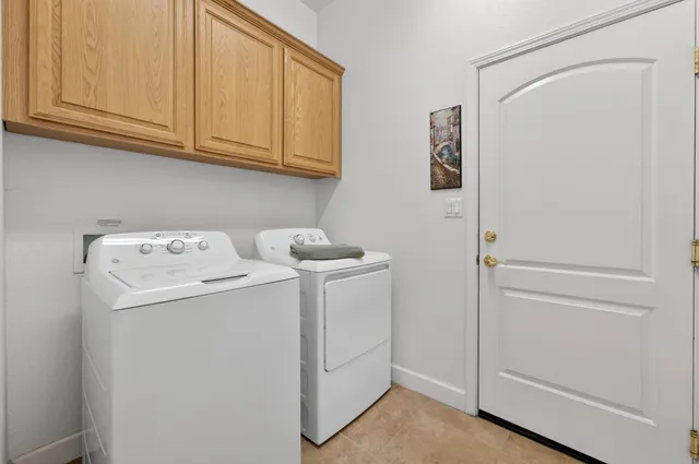 a view of a swimming pool with a lounge chairs