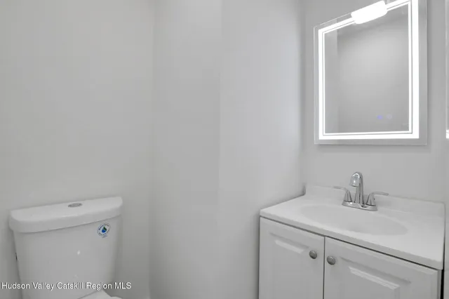 a bathroom with a sink and a toilet