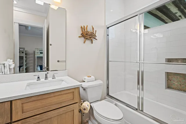 a view of a sink and a refrigerator