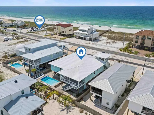 a view of a swimming pool with a lounge chairs