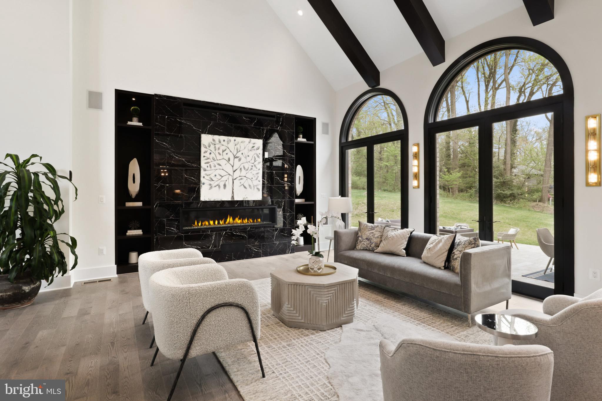 7227 Westerly Lane McLean, VA 22101 - Photo 10 of 76 Fire Place Surrounded by Glistening Dark Tile