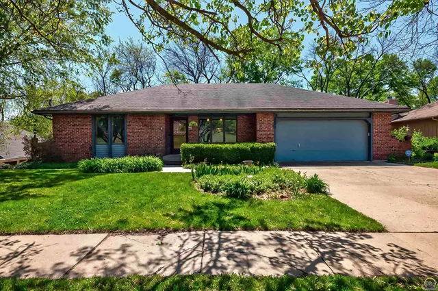 $350,000 | 3835 Southwest Wood Valley Drive, Topeka, KS 66610