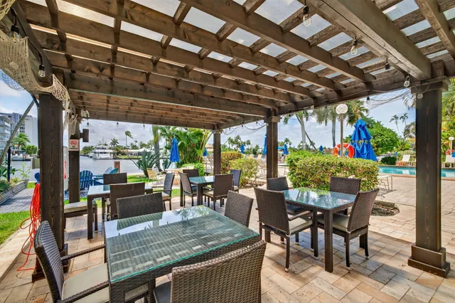 a view of a tables and chairs in patio