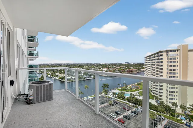 a view of balcony with furniture