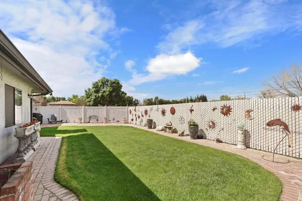 an aerial view of a houses with outdoor space