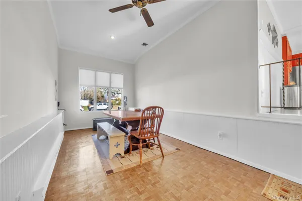 a workspace with furniture and a window