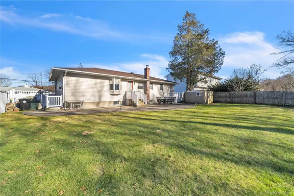 a view of a house with a big yard