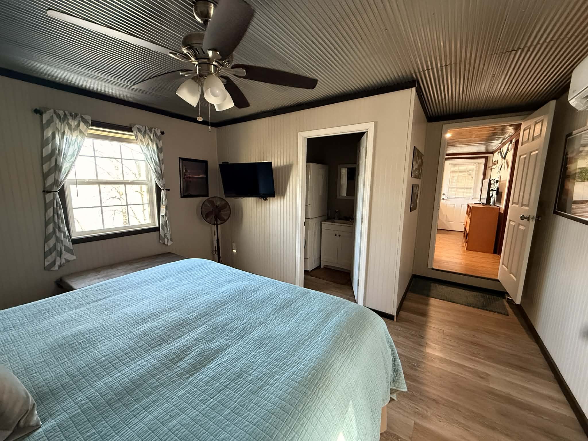 18531 Bream Bluff Athens, AL 35611 - Photo 21 of 41 a bedroom with a bed and a large window
