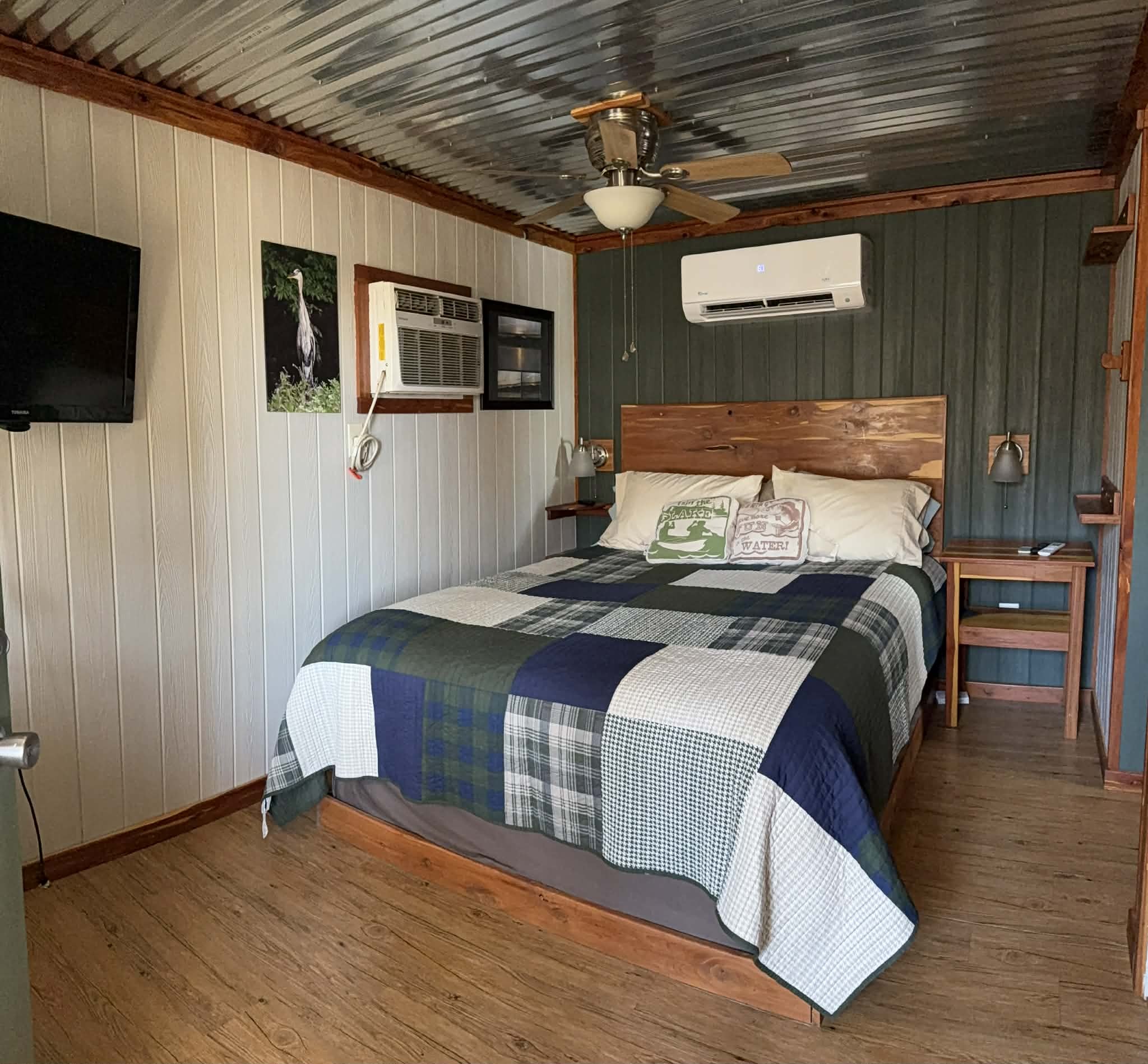 18531 Bream Bluff Athens, AL 35611 - Photo 6 of 41 a bedroom with a bed and a flat screen tv