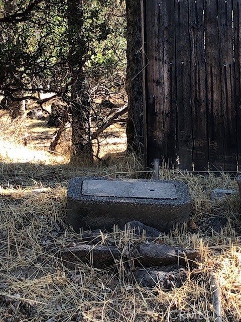 19200 Moon Ridge Road Hidden Valley Lake, CA 95467 - Photo 4 of 5 a view of patio with table and chairs and potted plants