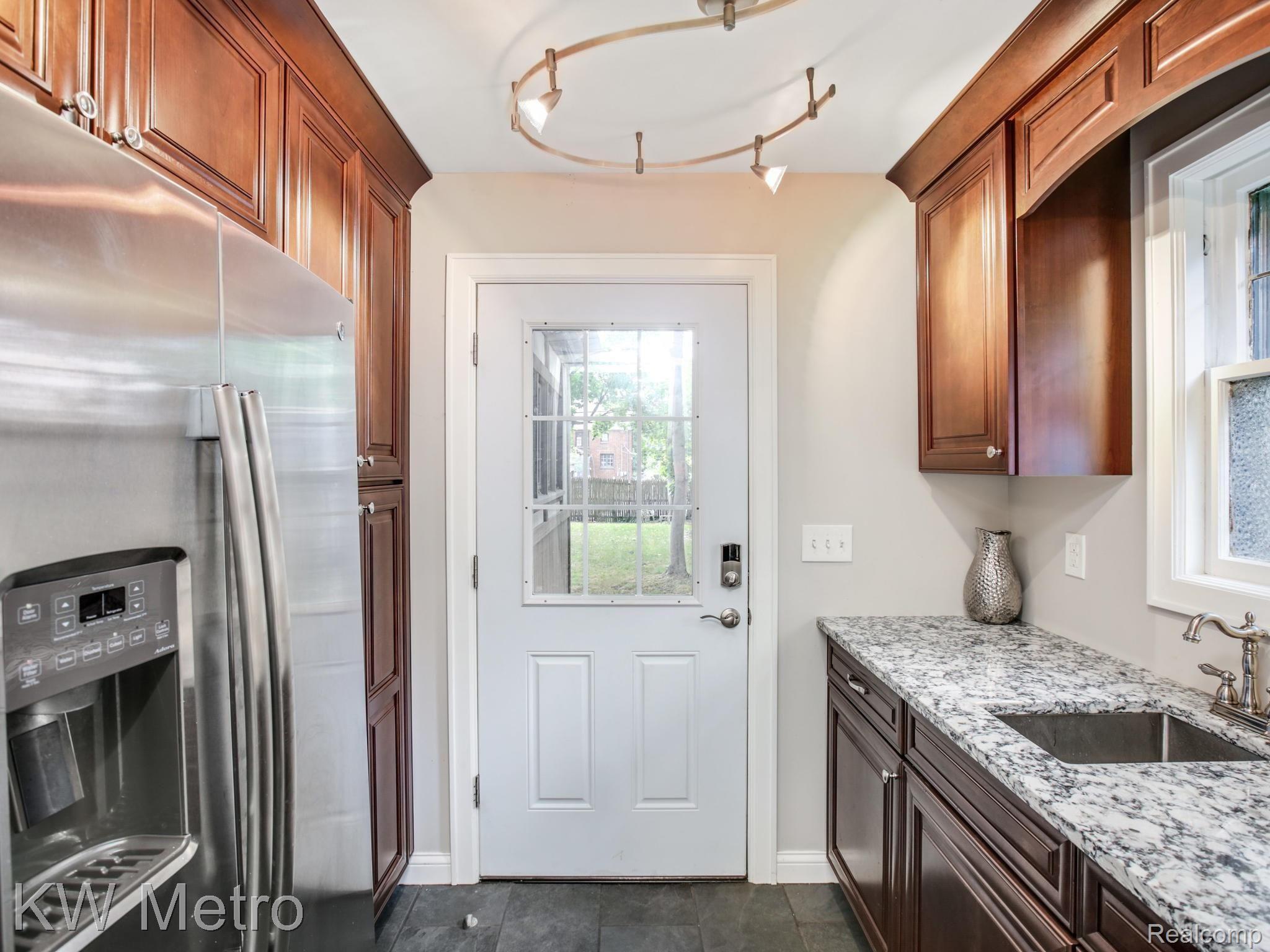 1235 Yorkshire Road Grosse Pointe, MI 48230 - Photo 12 of 51 Kitchen entrance to backyard