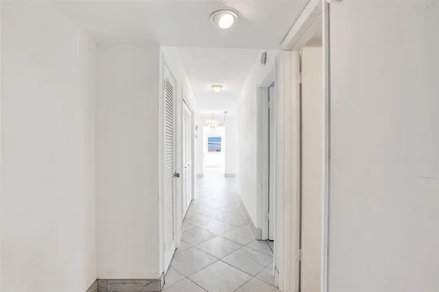 a view of a big room with windows and cabinet