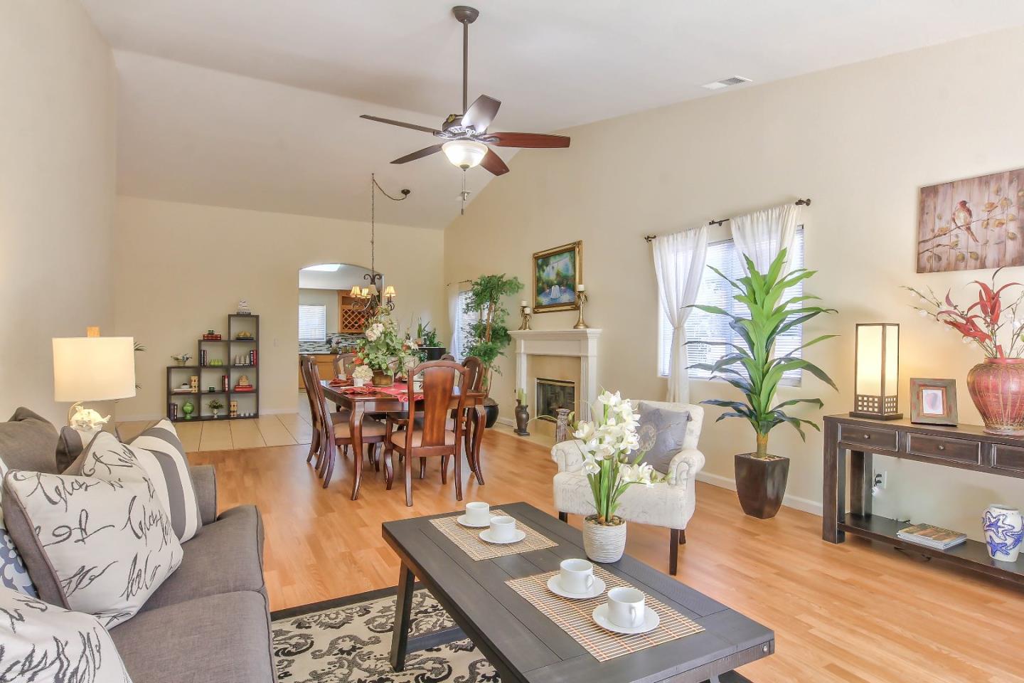 5502 Mesa Road Gilroy, CA 95020 - Photo 5 of 23 a living room with furniture potted plant and a table