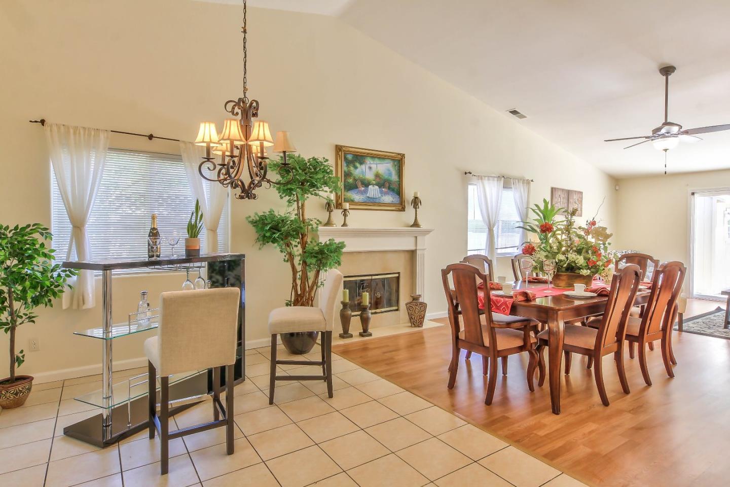 5502 Mesa Road Gilroy, CA 95020 - Photo 8 of 23 a view of a dining room with furniture and chandelier