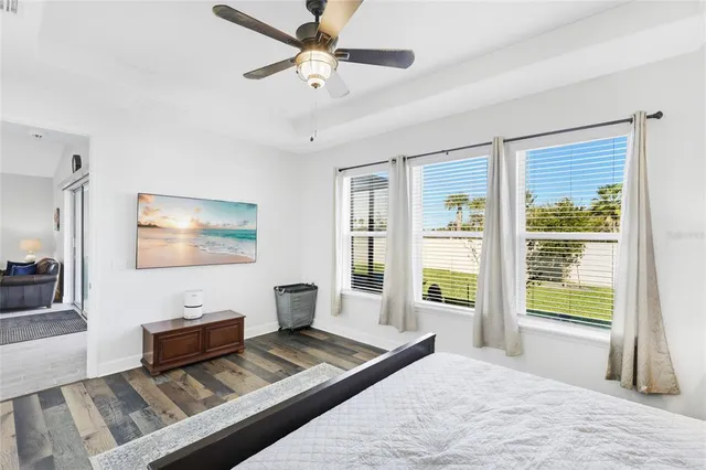 a bathroom with a toilet a sink and curtain