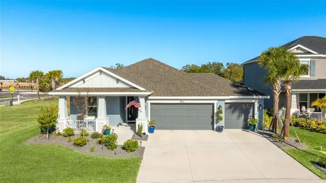 a swimming pool with outdoor seating yard and outdoor seating