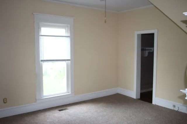 an empty room with a window