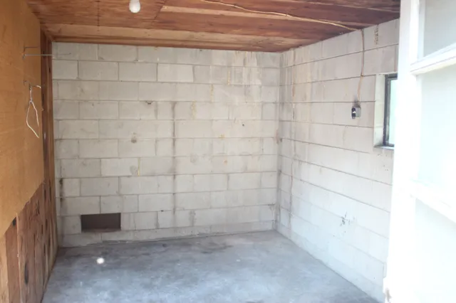a kitchen with a stove and cabinets