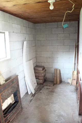 a view of a room with racks on the wall