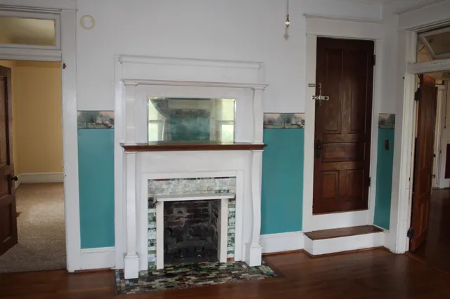 a living room with a fireplace