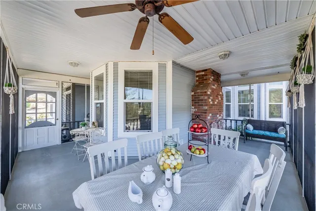 a kitchen with stainless steel appliances granite countertop a sink refrigerator and cabinets