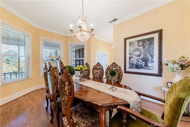 a view of a living room and dining room
