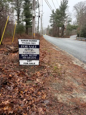 a sign on the side of the road