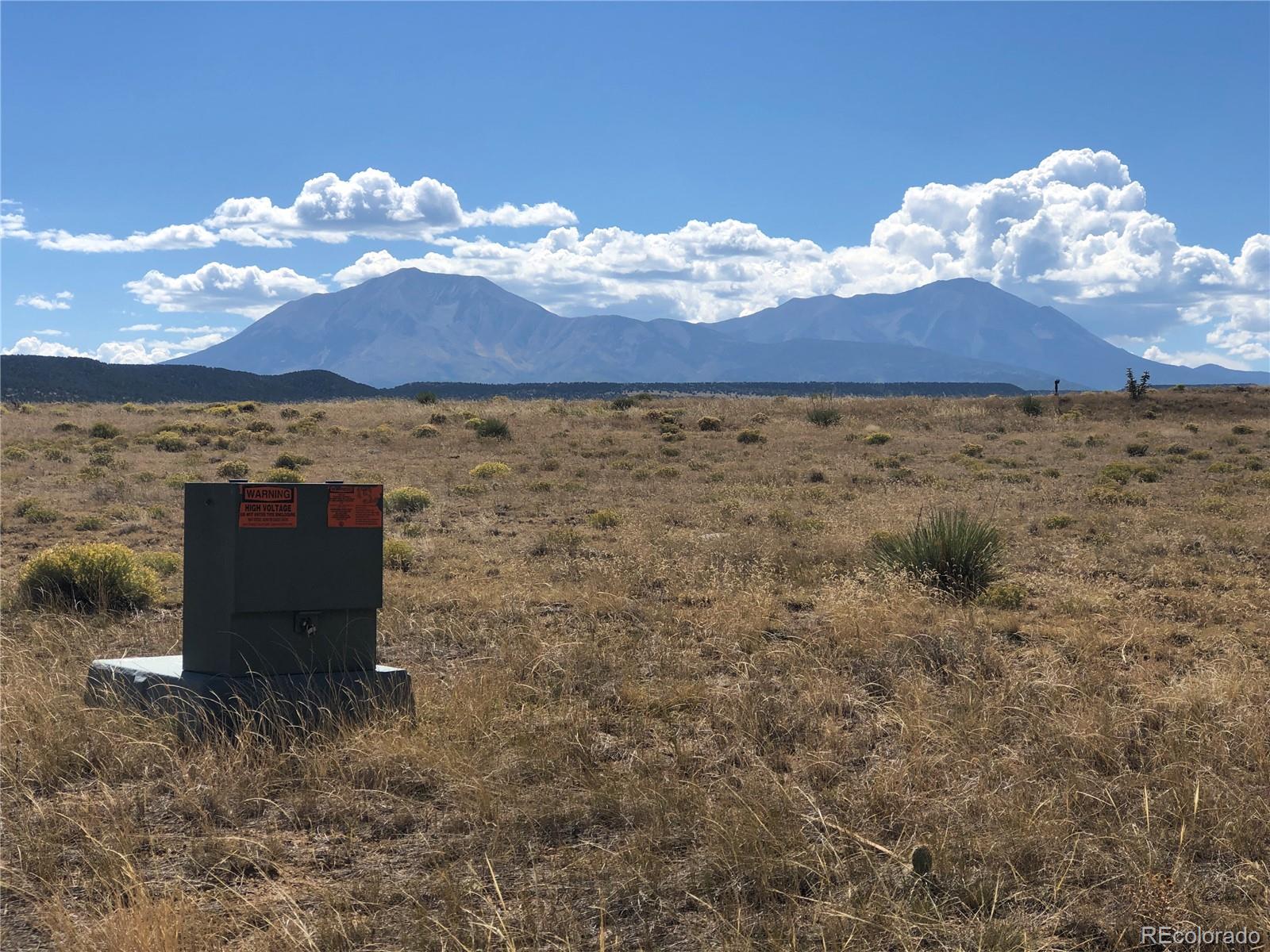 Lot 46 River Ridge Ranch Walsenburg, CO 81089 - Photo 1 of 17 a view of a fireplace with a garden