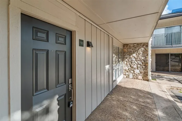 a view of a house with a street