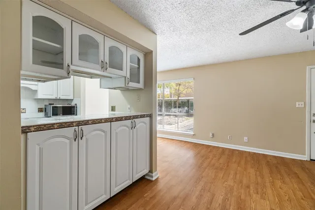 a very nice looking room with wooden floor