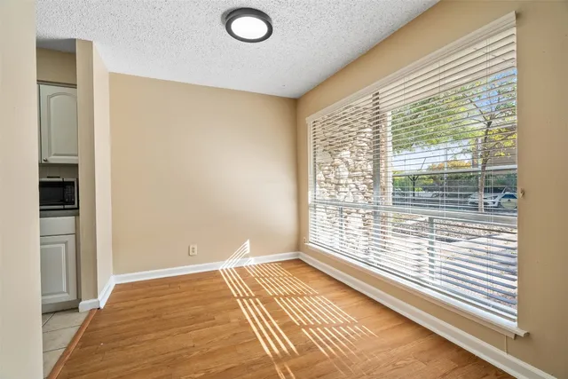 a view of a room with a large window