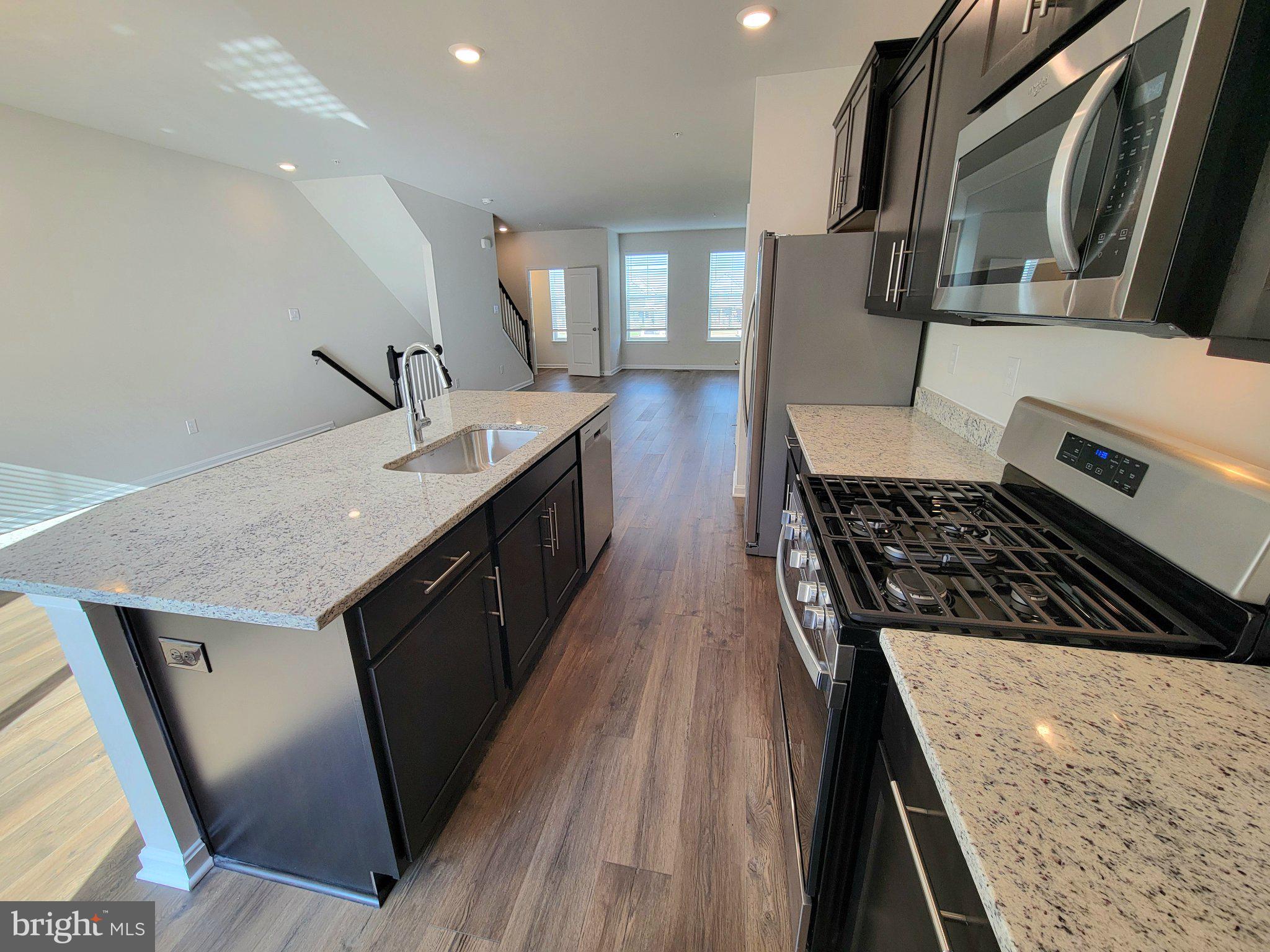 424 Herringbone Way Frederick, MD 21701 - Photo 4 of 21 Modern kitchen with sleek finishes.