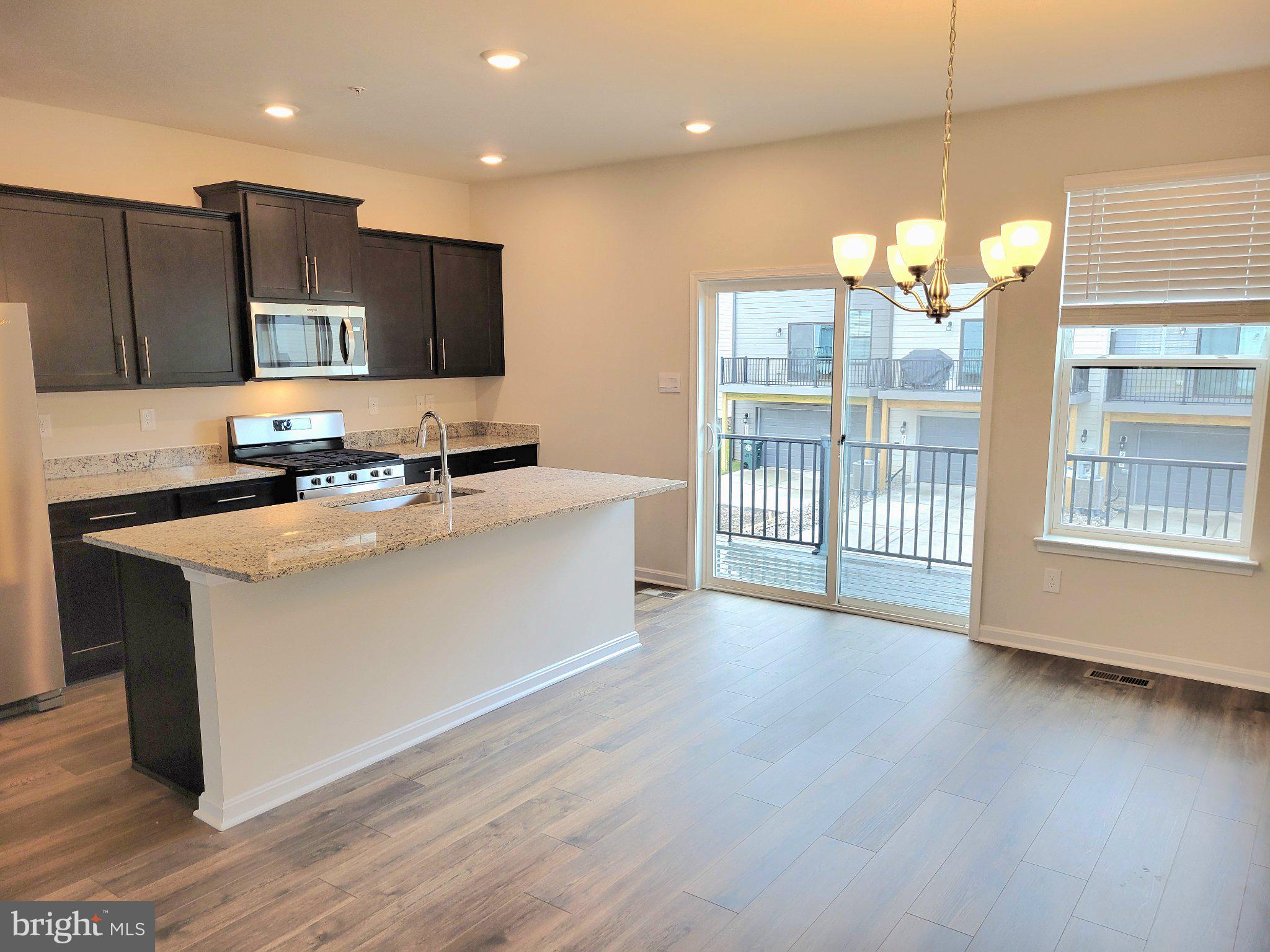 424 Herringbone Way Frederick, MD 21701 - Photo 5 of 21 Modern kitchen with natural light.