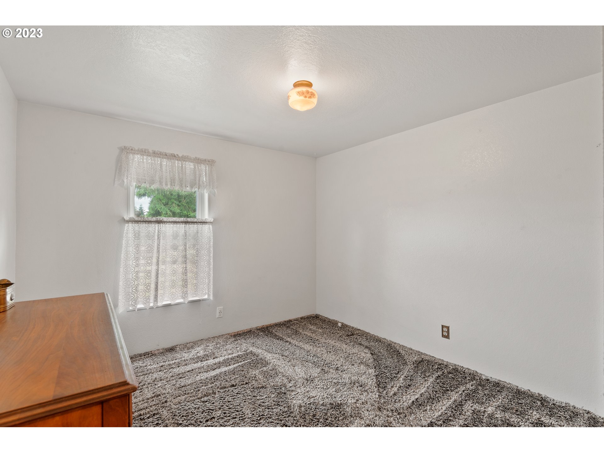 19119 Kelsey Marie Lane Southwest Rochester, WA 98579 - Photo 15 of 29 a view of an empty room and window