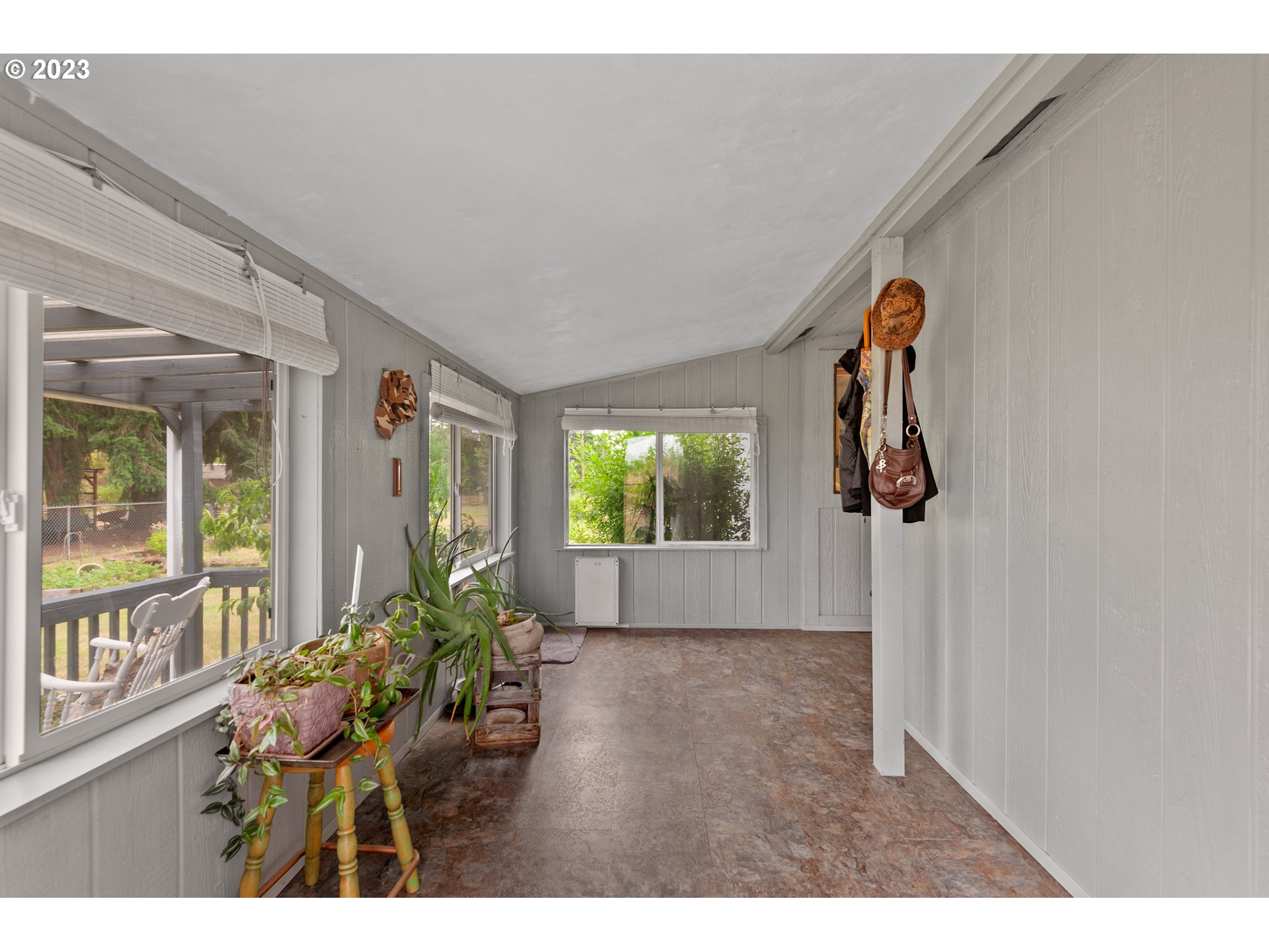 19119 Kelsey Marie Lane Southwest Rochester, WA 98579 - Photo 18 of 29 a living room with furniture and a large window