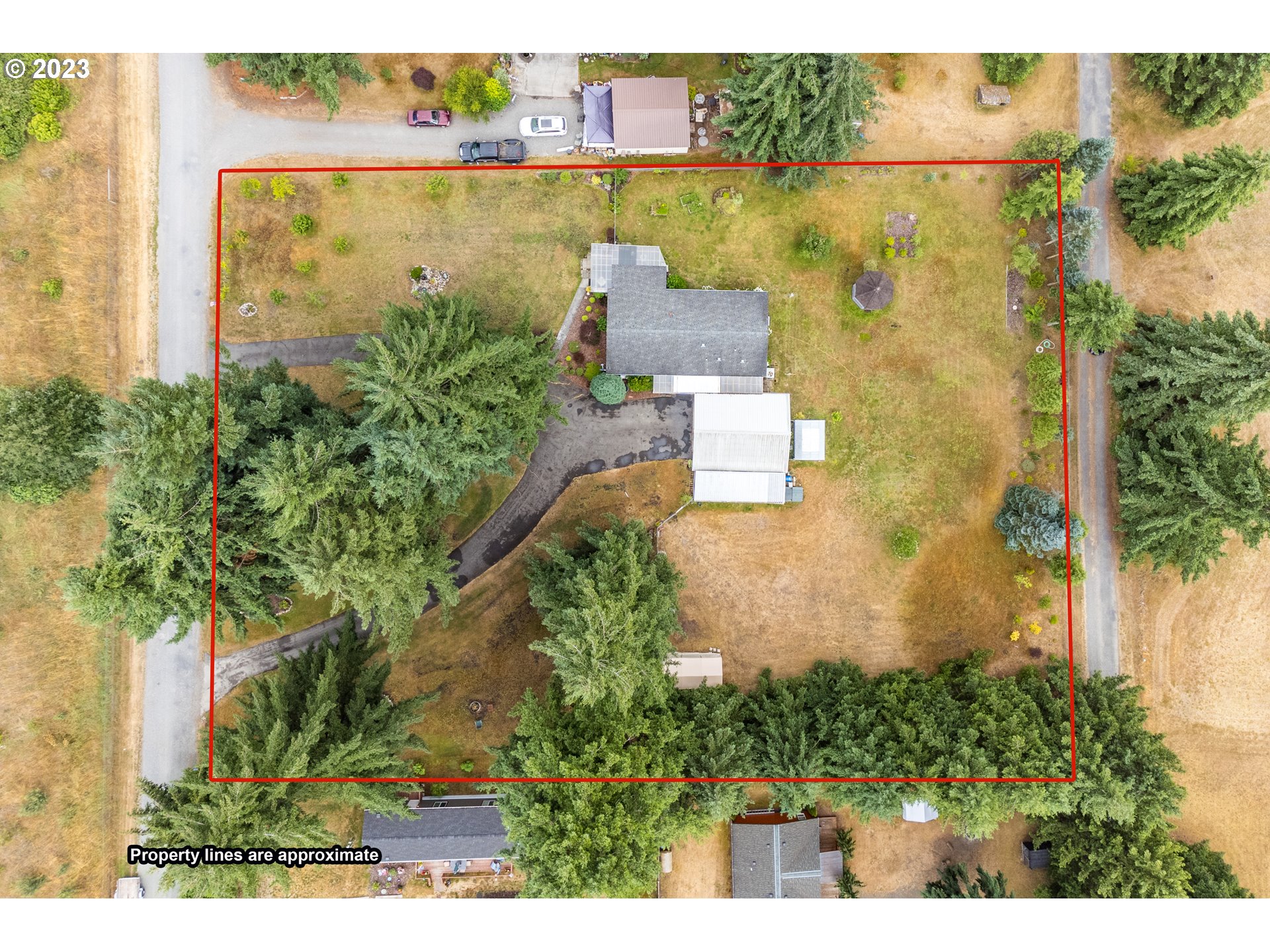 19119 Kelsey Marie Lane Southwest Rochester, WA 98579 - Photo 27 of 29 an aerial view of a houses with a yard