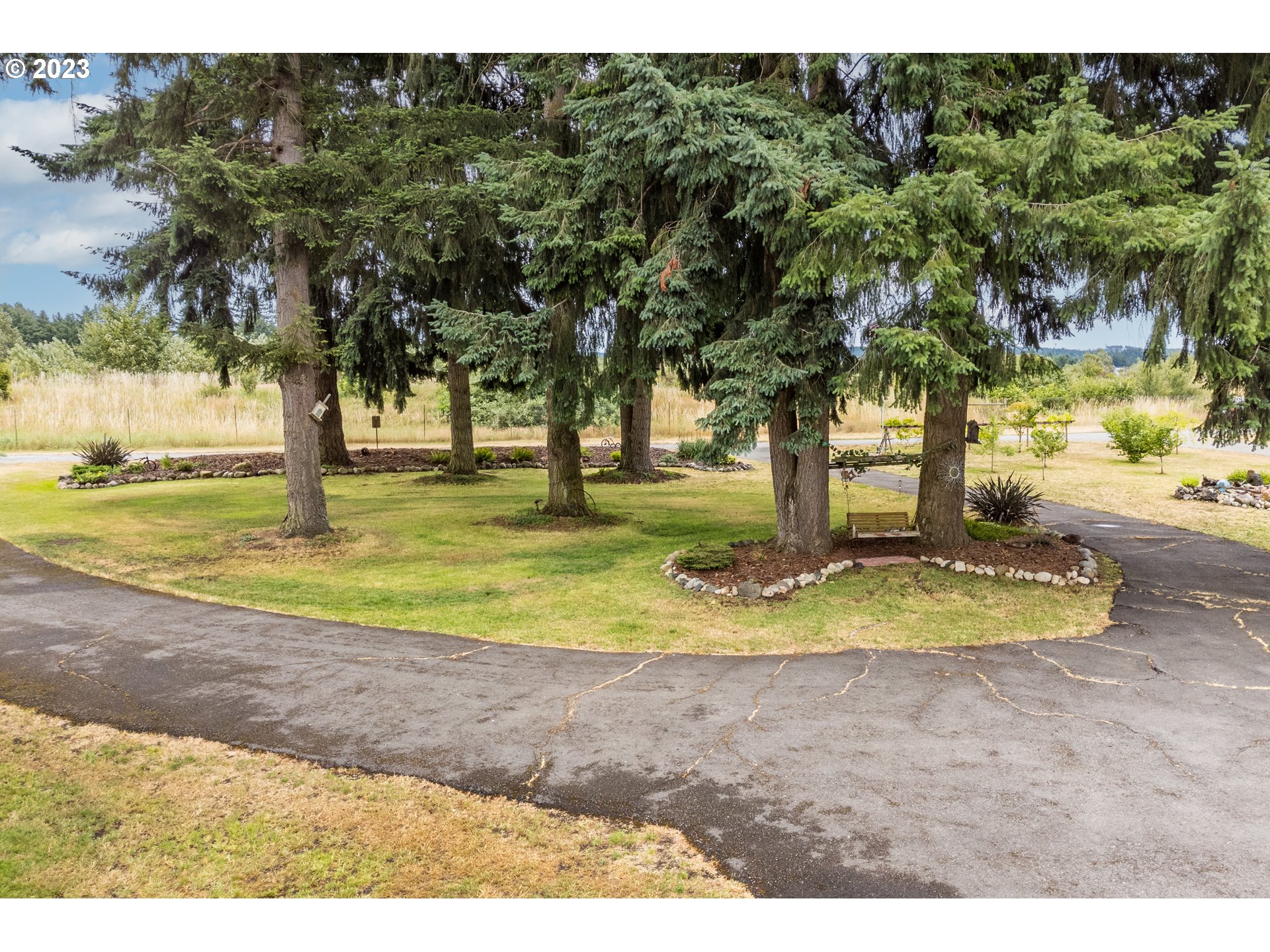 19119 Kelsey Marie Lane Southwest Rochester, WA 98579 - Photo 29 of 29 a view of a yard with swimming pool