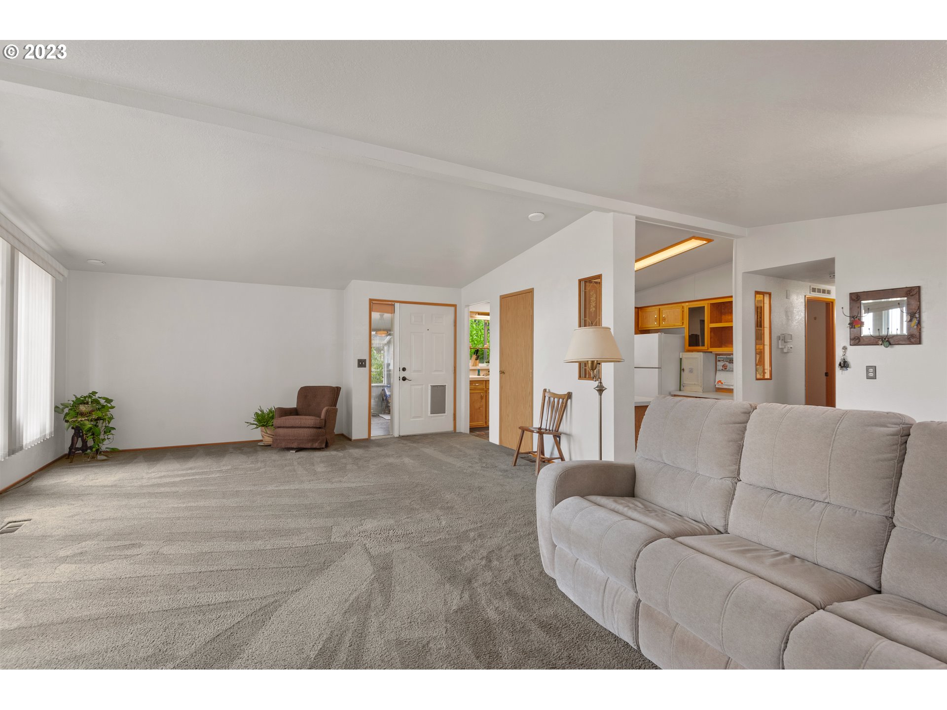 19119 Kelsey Marie Lane Southwest Rochester, WA 98579 - Photo 4 of 29 a living room with furniture and a table