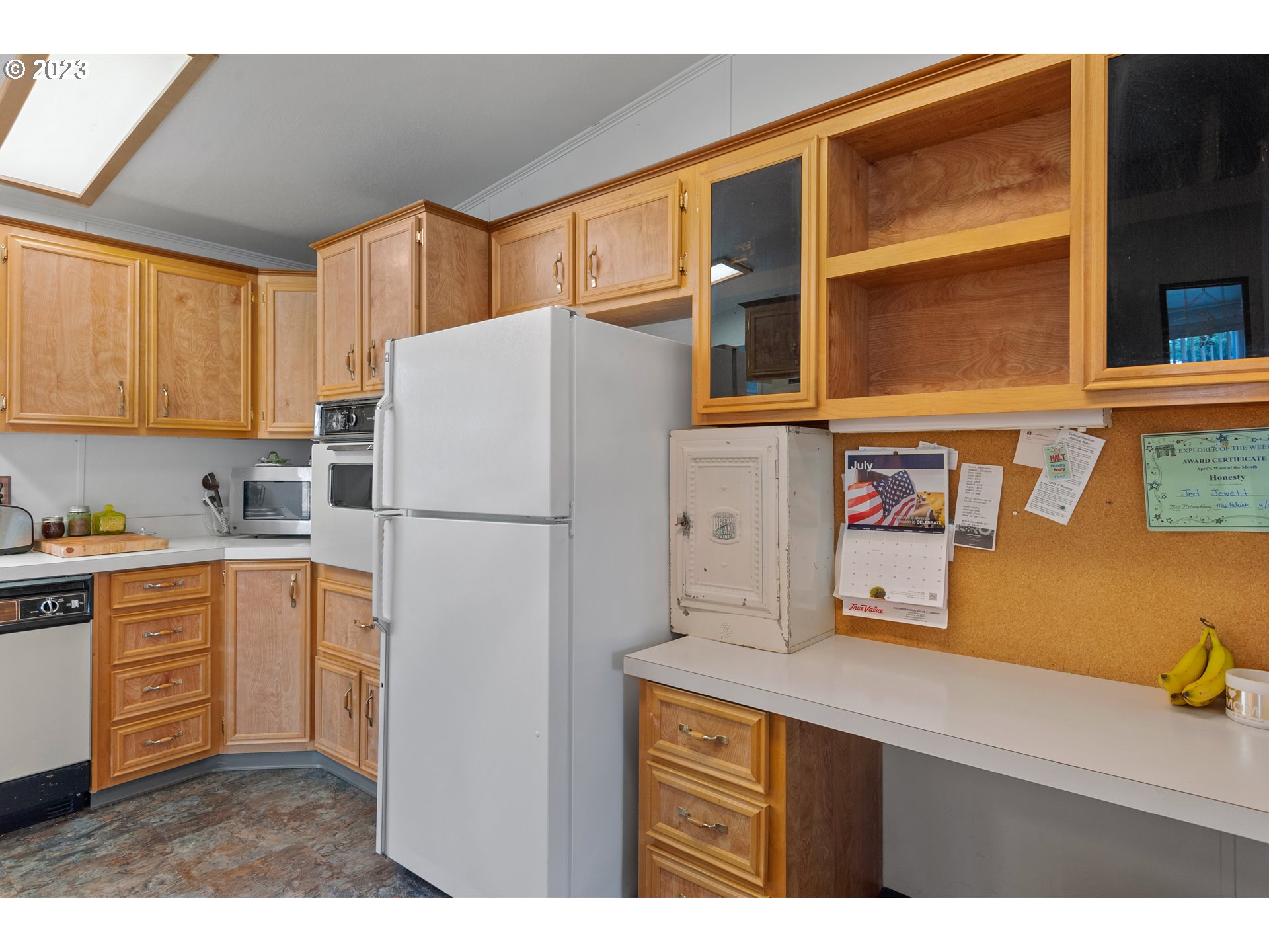 19119 Kelsey Marie Lane Southwest Rochester, WA 98579 - Photo 8 of 29 a kitchen with stainless steel appliances granite countertop a refrigerator a stove and a sink