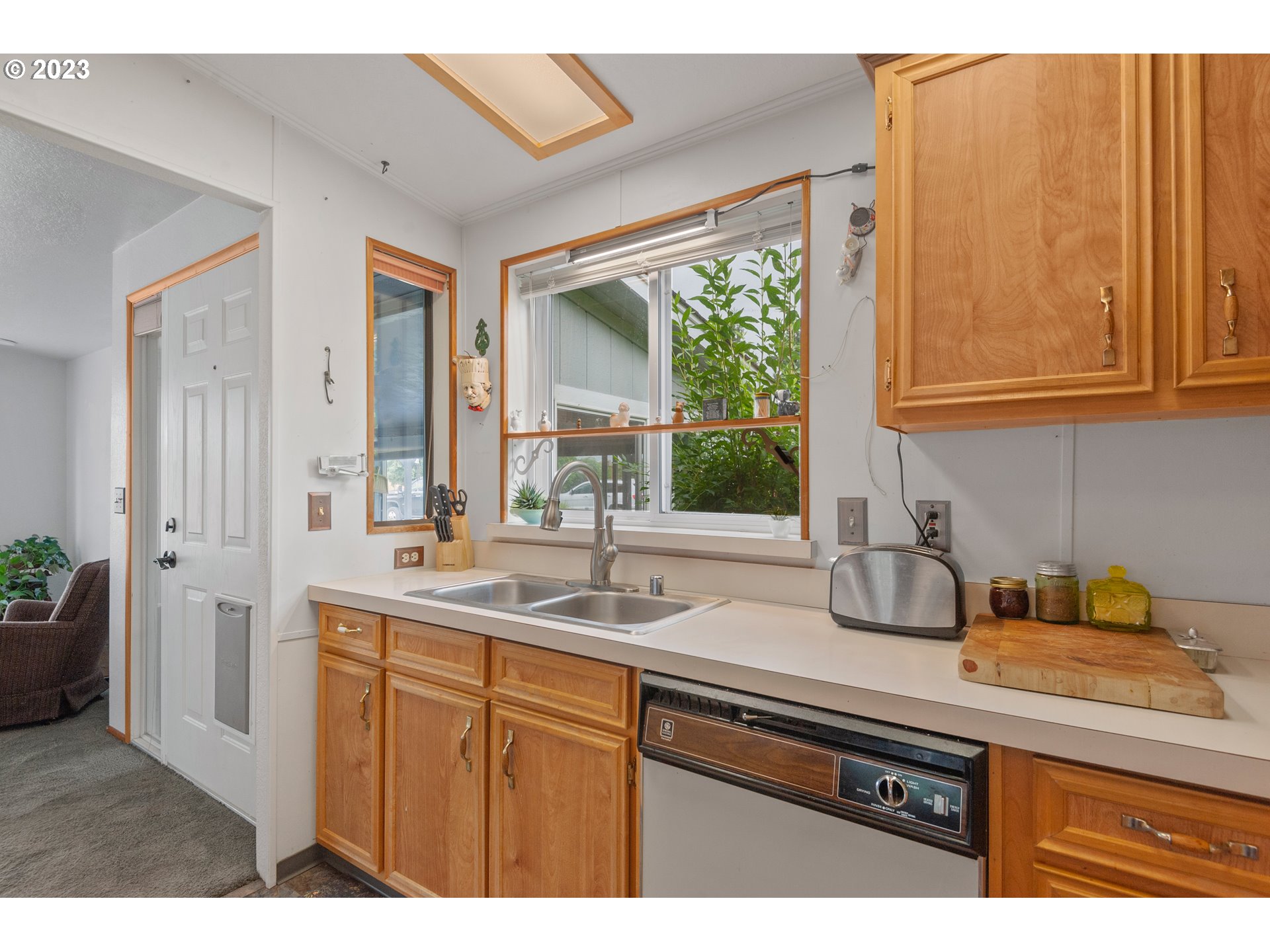 19119 Kelsey Marie Lane Southwest Rochester, WA 98579 - Photo 10 of 29 a kitchen with sink and window