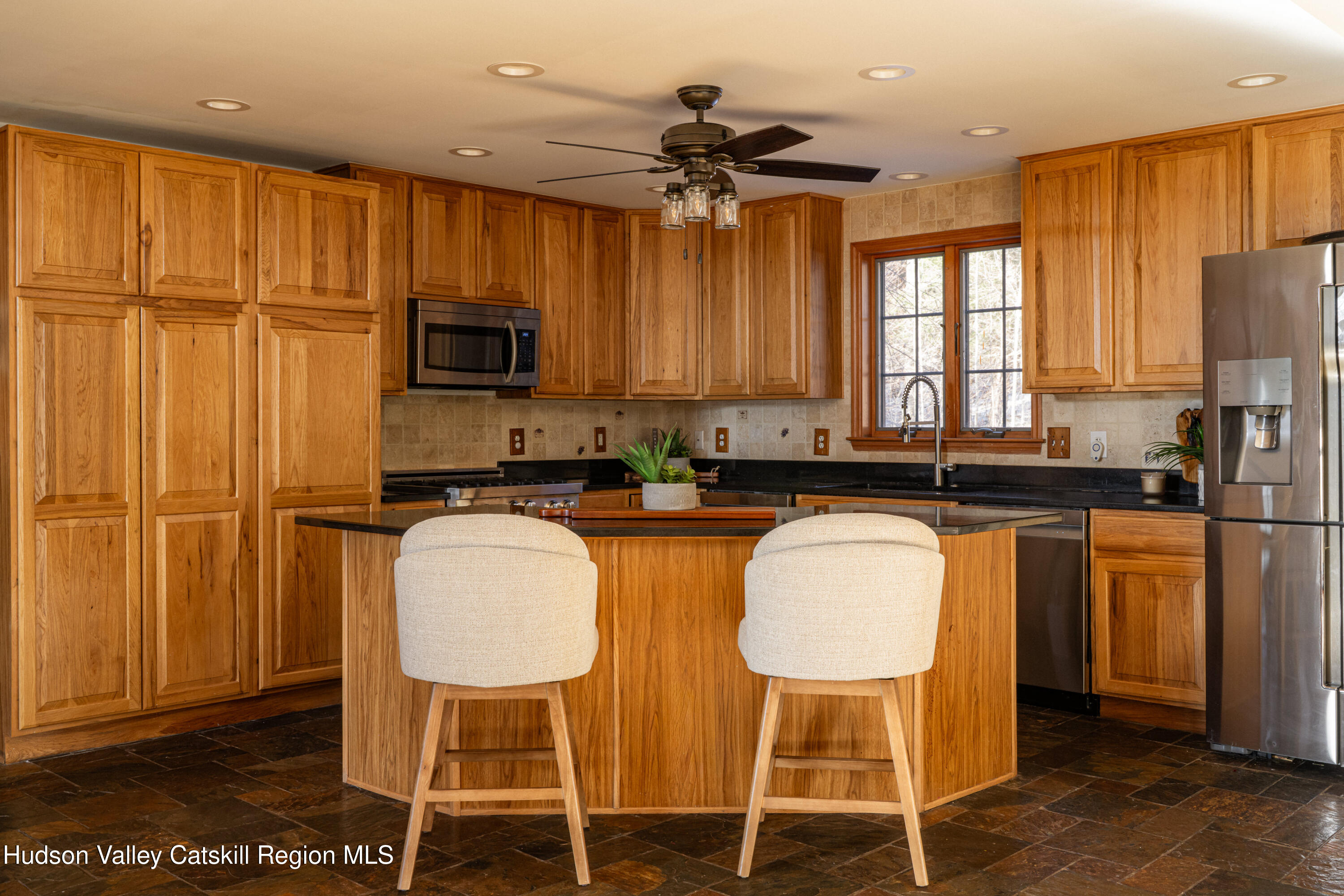37 Notch View Road Lexington, NY 12468 - Photo 12 of 71 a kitchen with stainless steel appliances granite countertop a stove a sink and a refrigerator