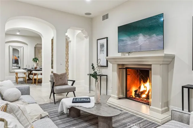 a living room with patio furniture